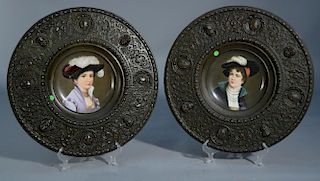 Pair of large brass plaques with round porcelain centers