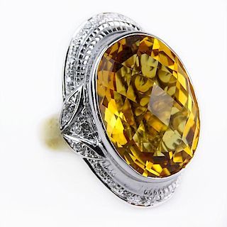 Approx. 30.0 Carat Criss Cross Oval Cut Citrine, Diamonds and 14 Karat Yellow and White Gold Ring.