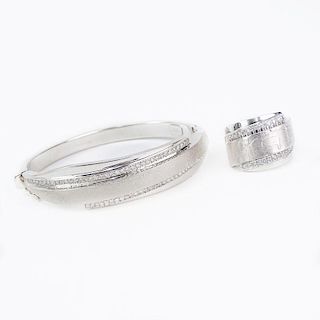 Vintage Israeli Diamond and 14 Karat White Gold Hinged Bangle Bracelet and Ring Suite. Diamonds F-G color, SI1-SI2 clarity.