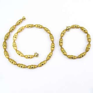 Vintage Milor Italian 18 Karat Yellow Gold Elongated Bead Necklace and Bracelet Suite.