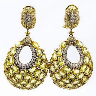 Approx. 30.0 Carat Yellow Sapphire, 1.0 Carat Diamond and 18 Karat Yellow Gold Pendant Earrings.