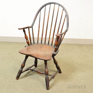 M. Rogers Black-painted Continuous-arm Windsor Chair, (damage), ht. 35 1/4, seat ht. 15 in.