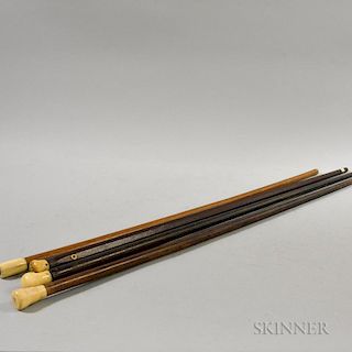 Four Whale Ivory and Hardwood Canes, 19th century, lg. to 37 1/4 in.