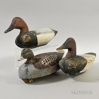 Three Carved and Painted Duck Decoys, one stamped "WLW," lg. to 16 in.