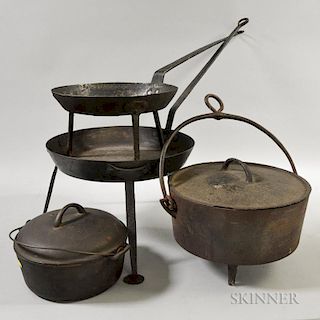 Two Cast Iron Covered Kettles and Two Tripod Pans.