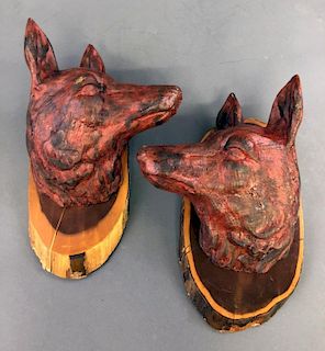 Two Wood Carved Fox Heads