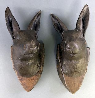 Two Wood Carved Rabbit Heads
