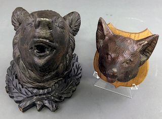 Carved Bear and Fox Heads