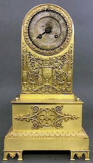 French Brass Clock with Relief Urn of Flowers