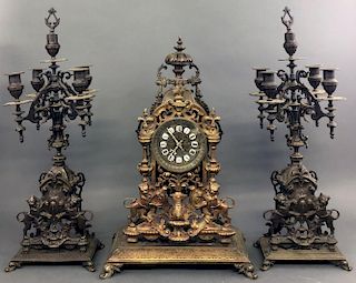 French Bronze and Metal Clock and Garniture Set