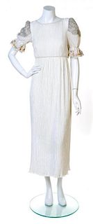 A Mary McFadden White Pleated Column Gown, Size 8.