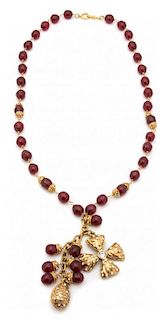 A Chanel Red Glass Demi Parure, 32"; Pendant: 5"; Earclips: 1" x .75".
