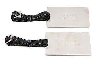 A Pair of Tiffany & Co. Silver Luggage Tags, Strap: 9"; Tag: 4" x 2.5".