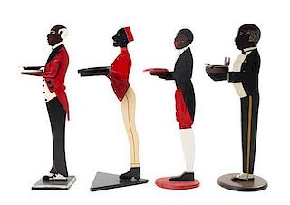 Four Standing African American Tip Trays Height of tallest 35 inches.