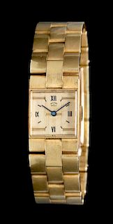 * An 18 Karat Yellow Gold Wristwatch, Van Cleef & Arpels,