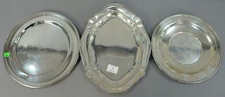 Three piece sterling silver lot including two round plates and one shaped plate