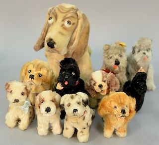 Group of eleven Steiff stuffed mohair dogs with movable parts to include Snobby grey Poodle, two Snobby black Poodles, dalmat