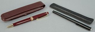 Two Montblanc pens to include maroon pen with ballpoint having gold rings marked Montblanc Meisters with leather holder and a