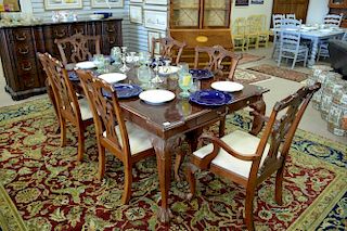 Mahogany seven piece dining set to include table with two 24in