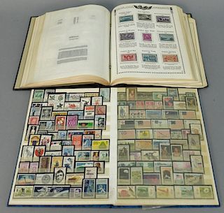 Two stamp albums of American stamps.