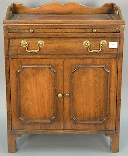 Smith and Watson mahogany leather top diminutive cabinet, ht. 27in., wd. 21in., dp. 12in.