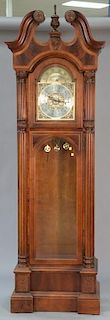Howard Miller mahogany tall clock with brass weights and pendulum. ht. 93in, wd. 24in.