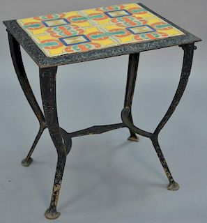 Iron table having tile top. ht. 20 in. top: 14 1/2in. x 10 1/2in.