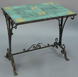 Tile top table with iron base having six tiles with three dimensional butterflies. ht. 27in. top: 21 1/2in. x 30in.