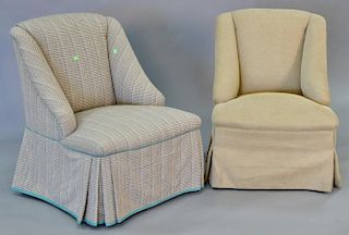 Pair of custom upholstered chairs with non matching upholstery.
