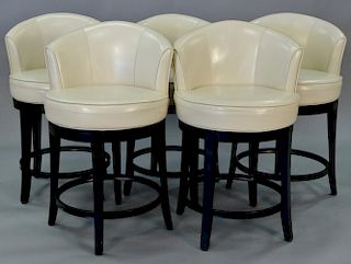 Set of five leather swivel bar stools with low backs. ht. 30in. seat ht. 25in.