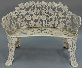 Iron outdoor bench having grape and vine motif. ht. 28 1/2in., wd. 39in.