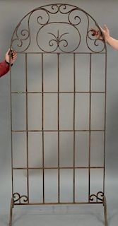 Large iron door or gate door with rounded top. ht. 78in., wd. 36in.