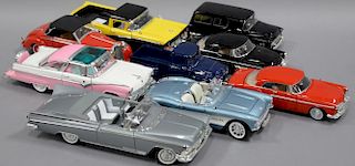 Group of nine 1950's 1:18 scale model cars including yellow 1957 Ford Ranchero, pink 1955 Ford Fairlane, grey 1959 Buick Elec