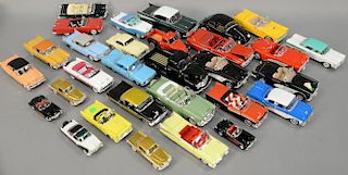 Group of thirty 1950's Model cars including two 1958 Studebaker Gold Hawks, Two 1957 black Corvettes, black and white 1955 Fo