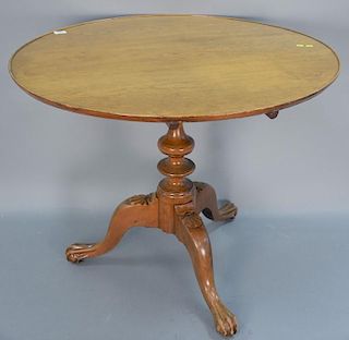 Chippendale cherry dish top table on tripod base with ball and claw feet (birdcage is rebuilt). ht. 29 1/2in., dia. 38in.