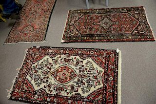 Three Hamaden Oriental throw rugs, 2'4" x 4', 2' x 4', and 2'3" x 4'8".