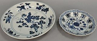 Two large Chinese blue and white porcelain chargers. dia. 10 3/4in. to 16 1/2in.
