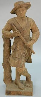 Large carved wood figure of a boy standing, having impressed mark on bottom,  Chapman made in Spain. ht. 40in.