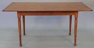 Custom cherry dining table having two 12in leaves. ht. 29 1/2in., Total lg. 86in., top closed: 36" x 62", top open: 36" x 86"