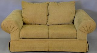 Contemporary tan upholstered loveseat. lg. 72in.