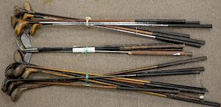 Group of eighteen golf clubs, mostly wooden shaft including four Walter Hagen, thirteen drivers with wood heads are Spalding,