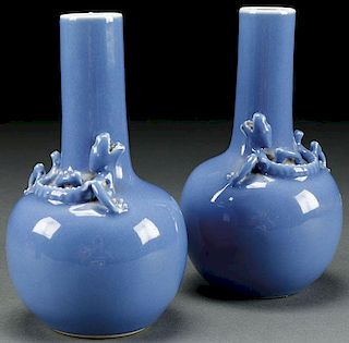 A PAIR OF CHINESE BLUE GROUND GLAZED “DRAGONS”