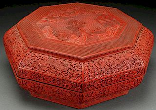 A LARGE AND IMPRESSIVE CHINESE CARVED CINNABAR