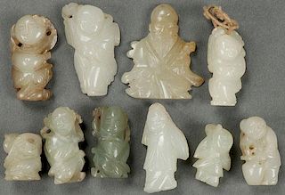 A GROUP OF TEN CHINESE CARVED JADE FIGURES