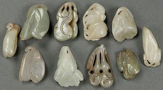 A TEN PIECE GROUP OF CHINESE CARVED JADE ORNAMENT