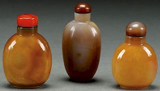 THREE CHINESE CARVED AGATE SNUFF BOTTLES