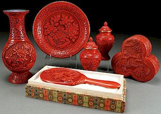 A SIX PIECE GROUP OF CHINESE CARVED CINNABAR RED