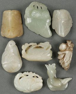 A GROUP OF EIGHT CHINESE CARVED JADE ORNAMENTS