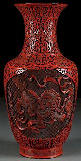 A CARVED CHINESE RED LACQUER CINNABAR VASE