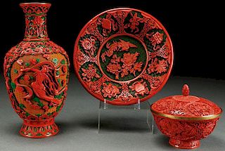 A THREE PIECE GROUP OF CHINESE CARVED CINNABAR